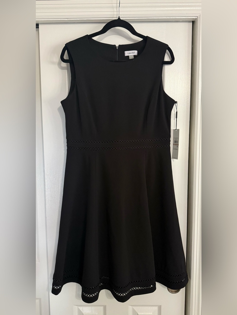 Calvin Klein Black Sleeveless Fit-and-Flare Dress with geometric cutwork details